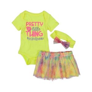 Baby’s graphic onesie with tutu skirt and head band.